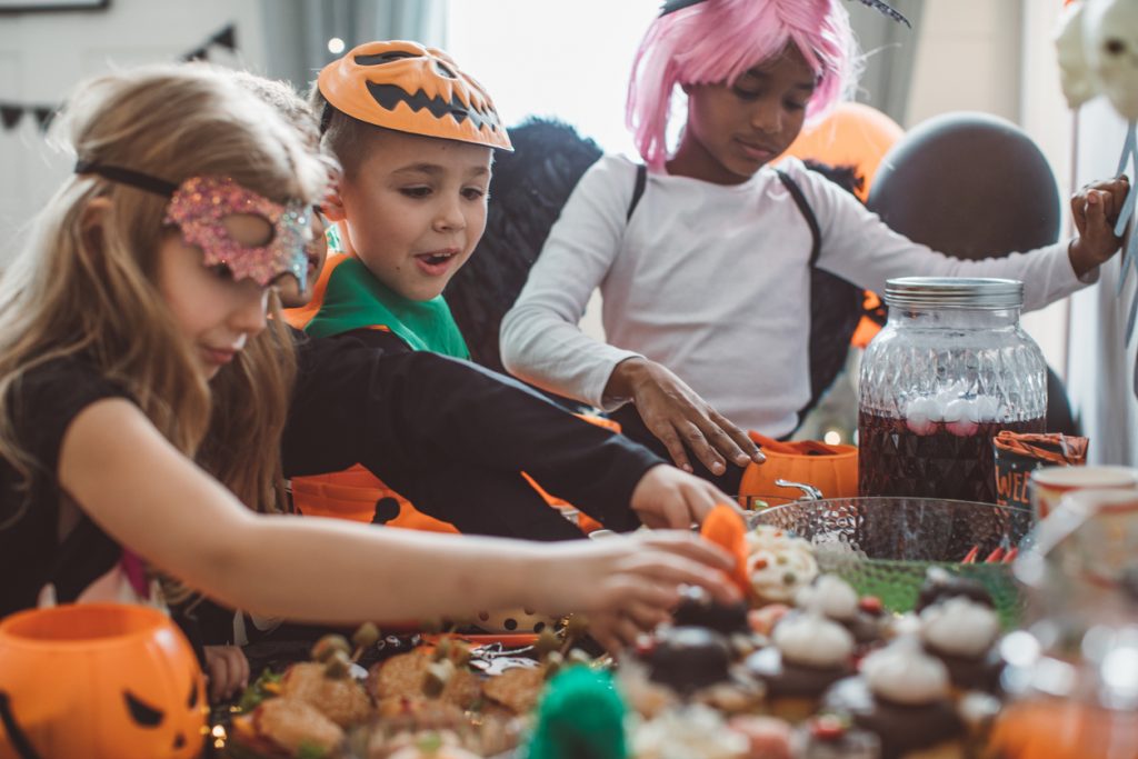 kids eating at halloween party
