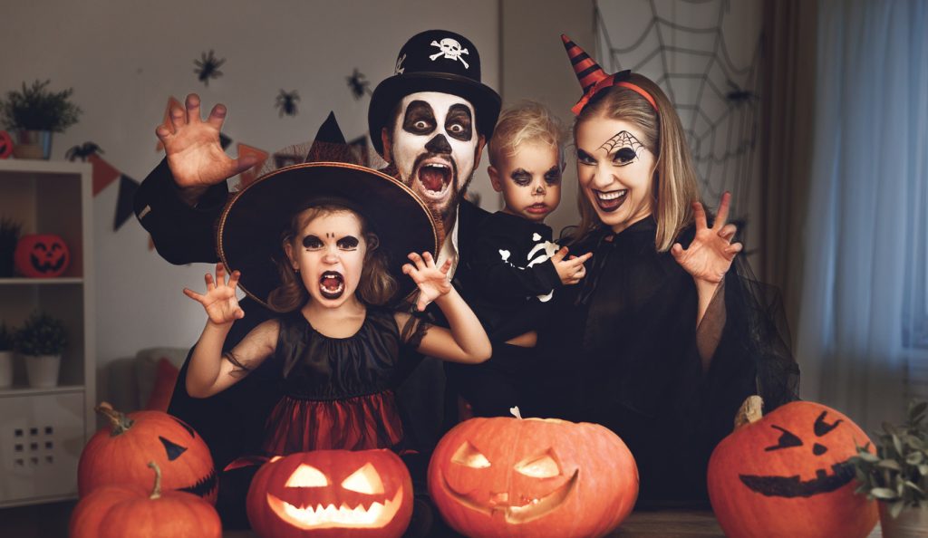 happy family dressed up for halloween