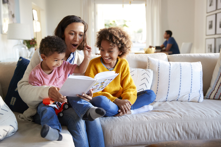 mother reading to her children